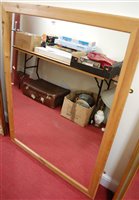 Lot 1224 - A modern pine framed rectangular wall mirror,...