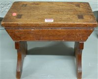 Lot 1229 - An early 20th century rustic elm milking stool,...