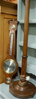 Lot 1230 - A 1920s turned oak standard lamp; together...