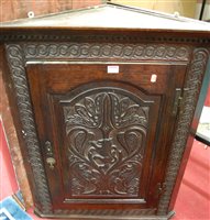 Lot 1239 - An early 19th century joined and relief carved...