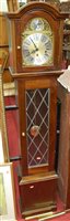 Lot 1241 - A reproduction mahogany grand-daughter clock,...
