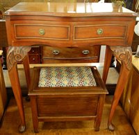 Lot 1255 - A reproduction walnut serpentine front single...