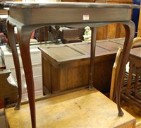 Lot 1257 - An Edwardian walnut shaped top occasional...