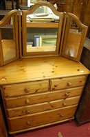 Lot 1261 - A modern pine round cornered chest of two...