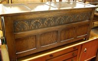 Lot 1263 - A Bevan Funnell joined oak four panelled hinge-...