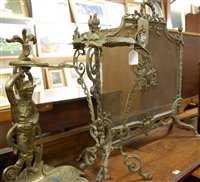 Lot 1265 - An early 20th century cast brass sparkguard,...