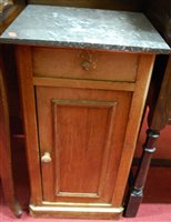 Lot 1277 - A Victorian faded mahogany and marble topped...