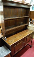 Lot 1280 - An early 20th century oak dresser, having...