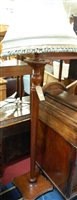 Lot 1283 - A 1930s walnut standard lamp, having hexagonal...