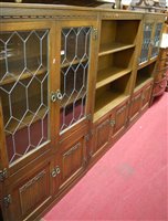 Lot 1293 - An Old Charm linenfold oak and lead glazed...