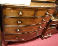 Lot 1296 - A mid-19th century mahogany bowfront chest of...
