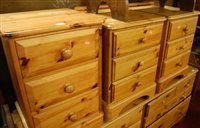 Lot 1315 - A pair of modern pine round corner three...