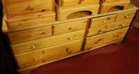 Lot 1316 - A modern pine round cornered sideboard fitted...