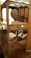 Lot 1325 - An early 19th century mahogany three-tier wash...