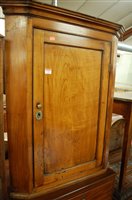Lot 1326 - An early 19th century elm single door hanging...