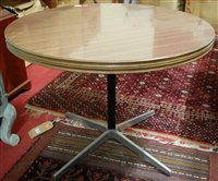 Lot 1350 - A 1970s formica topped circular low pedestal...
