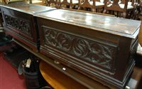 Lot 1354 - A near-pair of joined and floral relief carved...