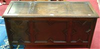 Lot 1331 - An early 20th century geometric moulded oak...
