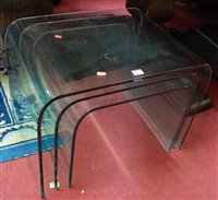 Lot 1360 - A contemporary nest of three heavy plate glass...
