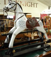 Lot 1334 - A Victorian style dapple grey rocking horse,...
