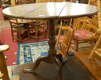 Lot 1364 - A provincial George III planked top oak...
