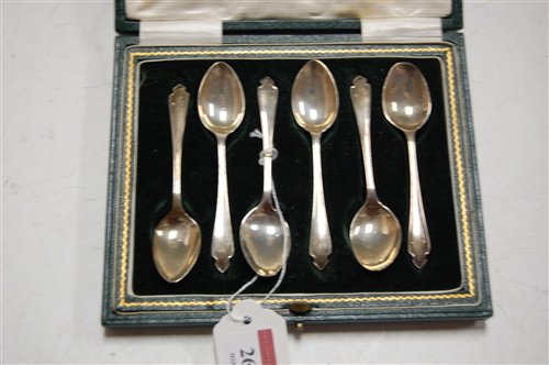 Lot 262 - A set of six George V silver teaspoons in...