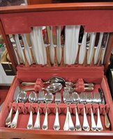 Lot 292 - A 1980s suite of silver plated cutlery in teak...
