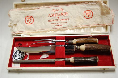Lot 280 - A mid 20th century three piece carving set...