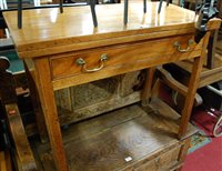 Lot 1376 - An early 19th century mahogany fold-over tea...