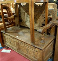 Lot 1377 - A circa 1900 line carved oak twin panelled...