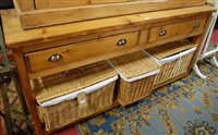 Lot 1381 - A modern pine dresser base, having two frieze...