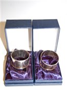 Lot 491 - A pair of modern boxed silver napkin rings