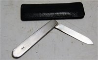 Lot 502 - An engine turned silver pocket fruit knife,...