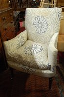 Lot 1395 - A beech framed and upholstered armchair,...