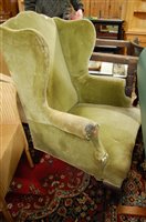 Lot 1397 - A late 19th century upholstered wingback...