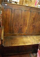 Lot 1403 - An antique joined elm seven panel long box...