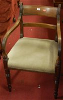 Lot 1410 - A 19th century mahogany bar back elbow chair,...