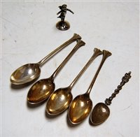 Lot 513 - A set of four silver teaspoons by Elkington &...