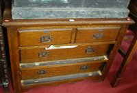 Lot 1440 - An early 20th century oak chest of two short...