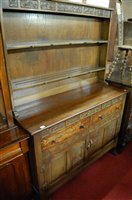 Lot 1445 - A contemporary moulded oak dresser, width 124cm