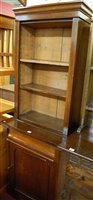 Lot 1446 - A Victorian oak narrow bookcase cupboard, the...