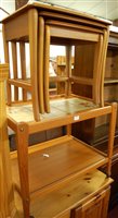 Lot 1447 - A 1980s teak and tiled inset two tier tea...
