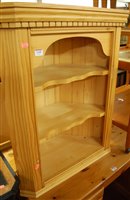 Lot 1448 - A modern pine open corner shelf