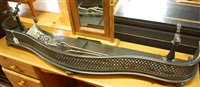 Lot 1451 - A 19th century steel serpentine pierced fender,...