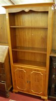 Lot 1455 - A reproduction yew wood freestanding open...