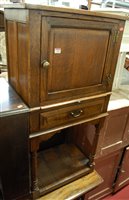 Lot 1460 - A joined oak single door side cupboard having...