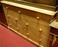 Lot 1469 - A modern pine round cornered sideboard fitted...