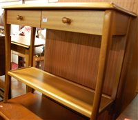 Lot 1472 - A contemporary teak two-tier two drawer side...