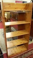 Lot 1480 - A modern pine freestanding open bookshelf,...