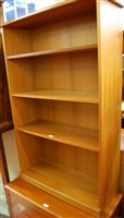 Lot 1485 - A contemporary teak freestanding open...